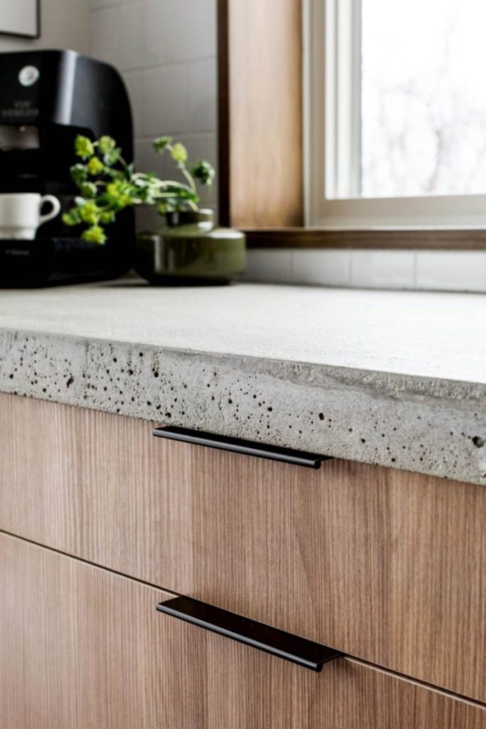 Close Up View of Concrete Countertop and Wooden Drawers