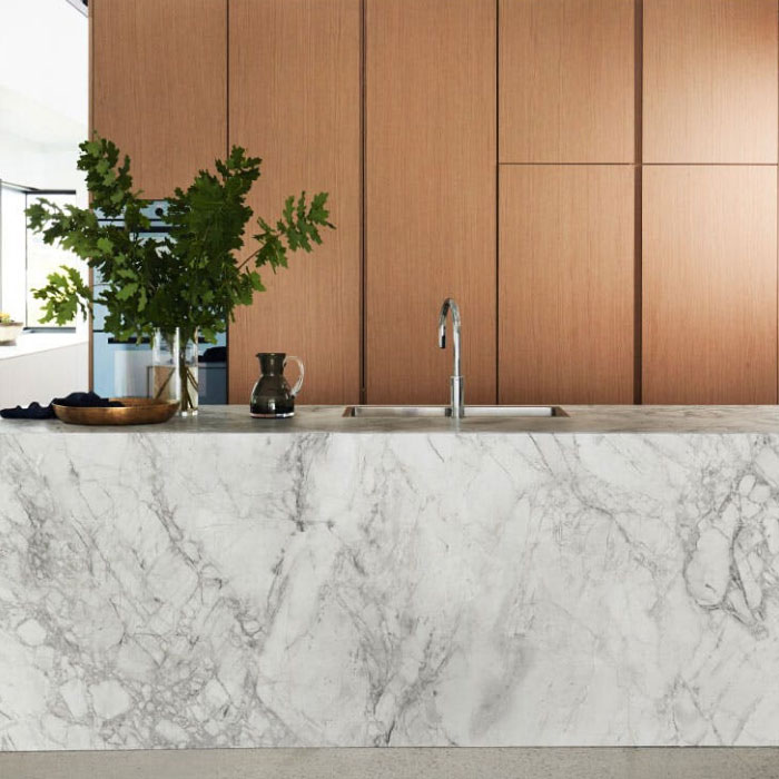 Kitchen with Dekton Island Material and Wooden Cabinetry